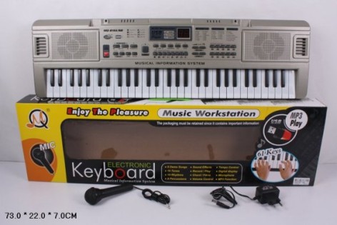 Орган музичний 61 клавіша, мікрофон, працює від зарядного та на батарейках, у коробці 73*22*7 см