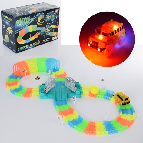 Трек світло.в темряві,машинка9,5см-їздить,світло, кулька,96дет,на бат-ці,у кор-ці,27-18-13см 