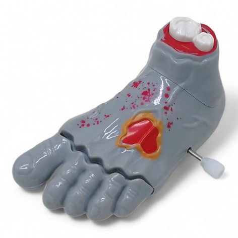 Игрушка заводная Нога м.7417