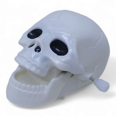 Игрушка заводная Череп м.7410
