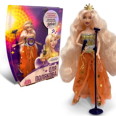 Лялька колекційна OLGA POLYAKOVA муз. в помаранчевому вбранні,костюм ручна робота,співає 3 пісні укр. мовою, кор. 38,5х30х5,5см 