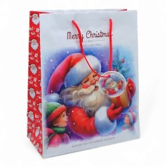 Пакет бумажный подарочный 26х32х12 см. Санта с подарком.