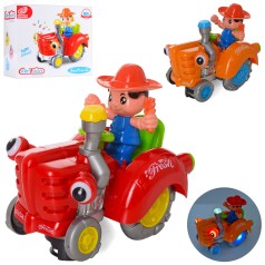 Трактор 19см,фігурка, муз,світло,їздить,рухомі деталі,2кол,на бат,у кор-ці,19-16-11,5см 