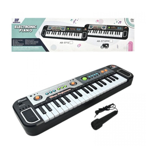 Синтезатор піаніно, звуки, радіо, регулювання гучності, мікрофон, в коробці